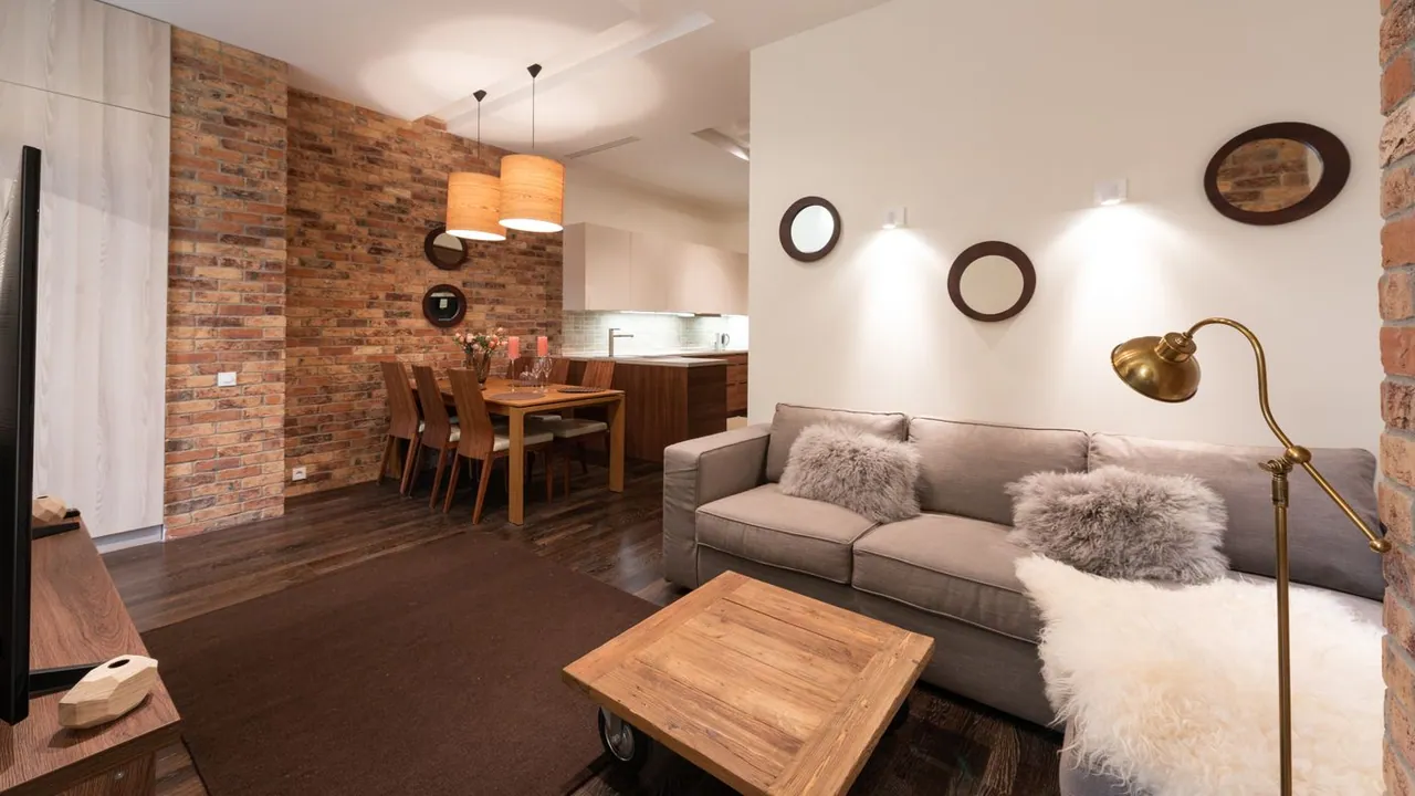 Open-plan living and kitchen area in a South Florida home — smoke from one room spreads residue through the whole space